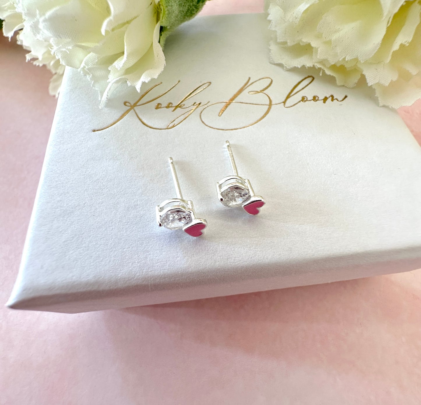 925 sterling silver Tiny Pink heart CZ stud earrings.