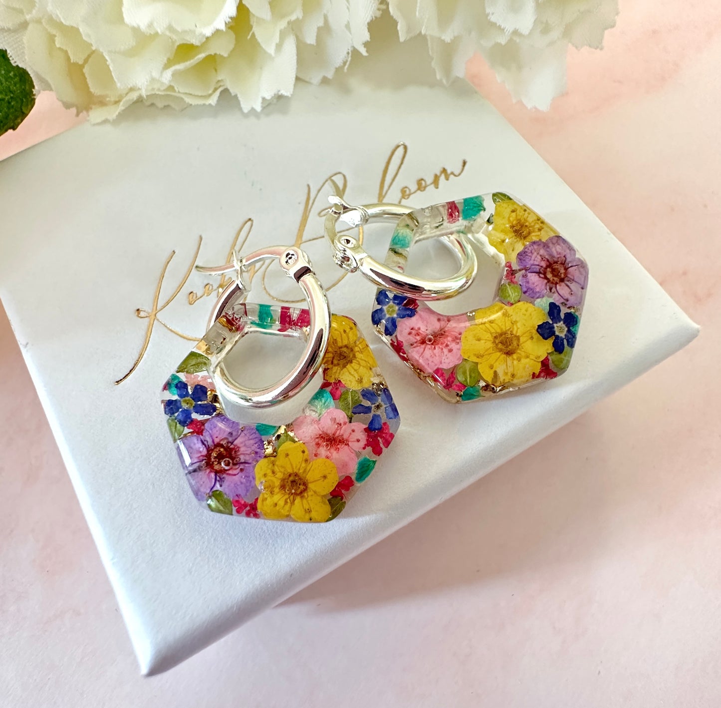 Colourful flower hexagon bloom earrings.