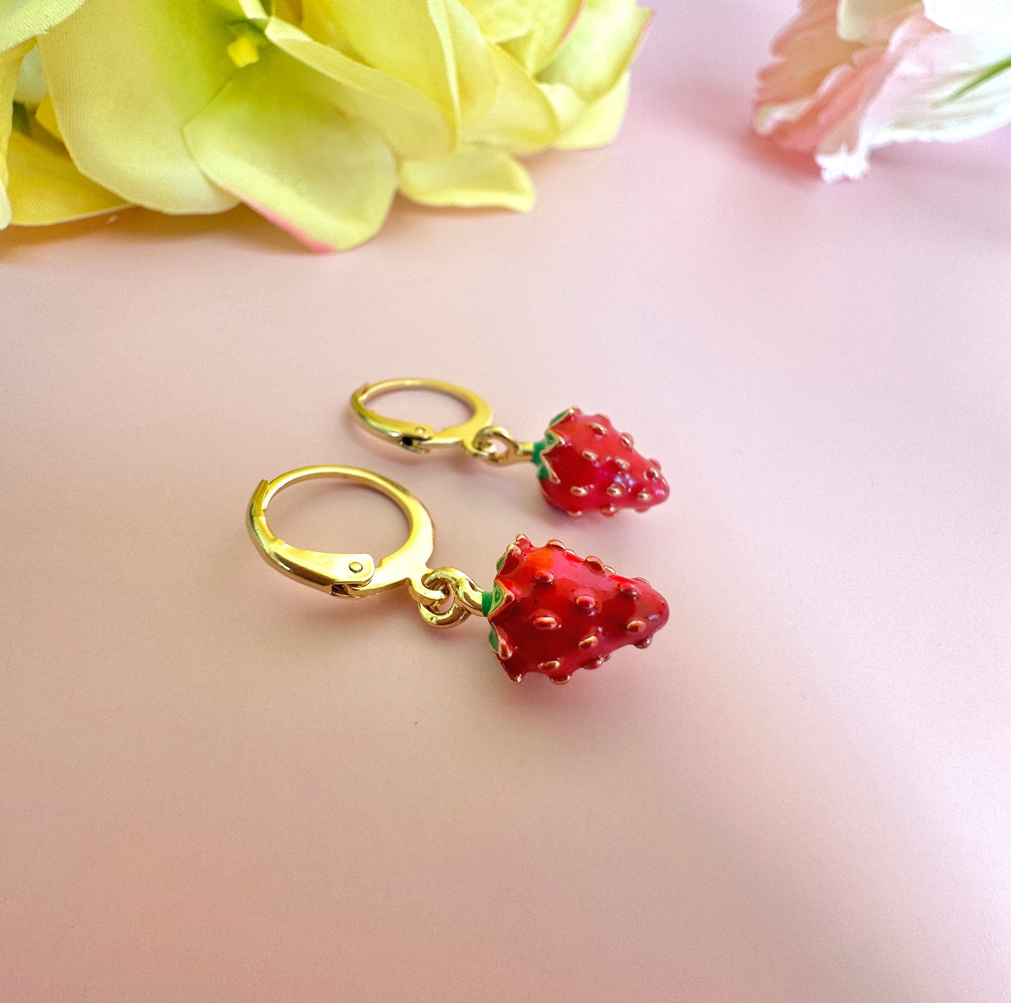 Tiny enamel Strawberry gold huggie earrings.