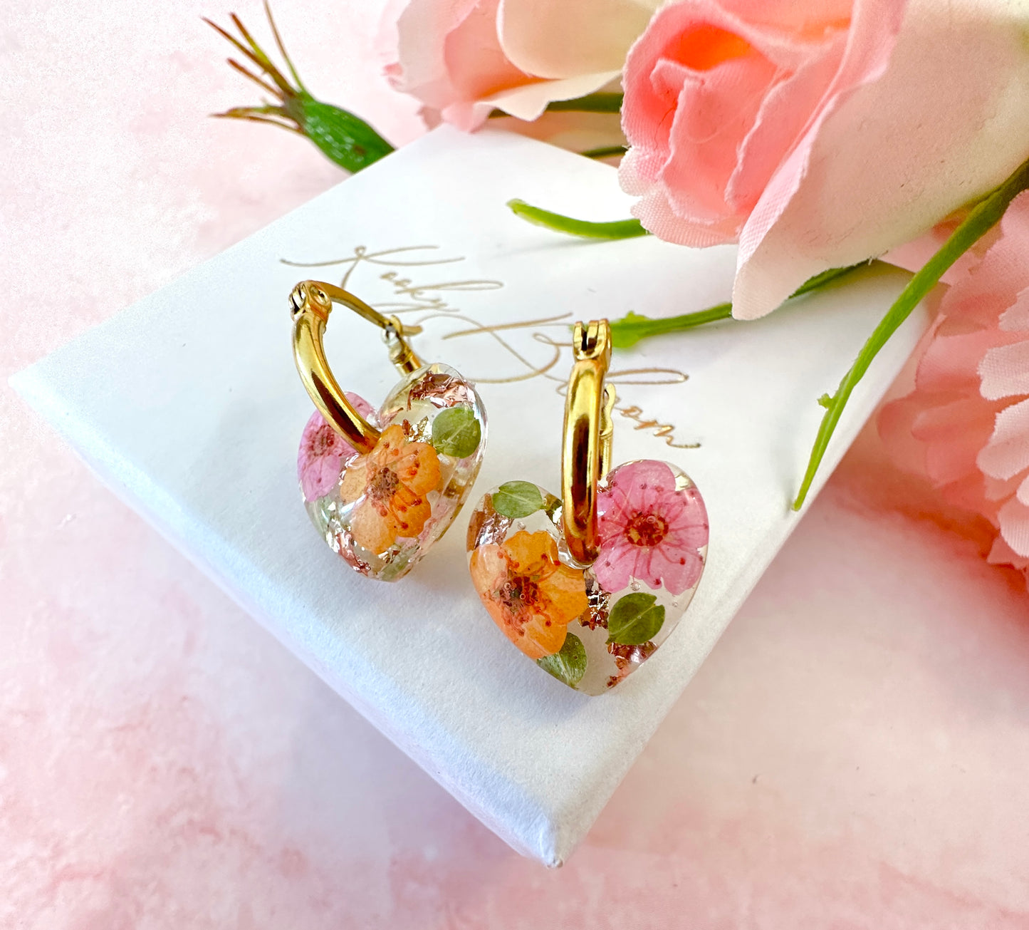 Mini Tangerine pink Flower Heart bloom earrings.