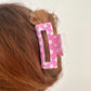 Pink Daisy flower print hair claw clip.