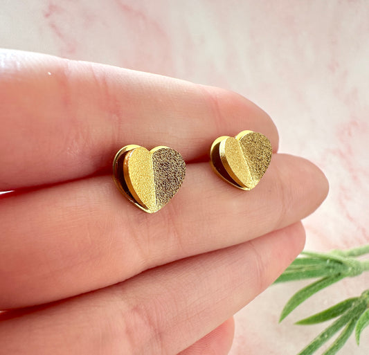 Gold 3d Heart stud earrings.