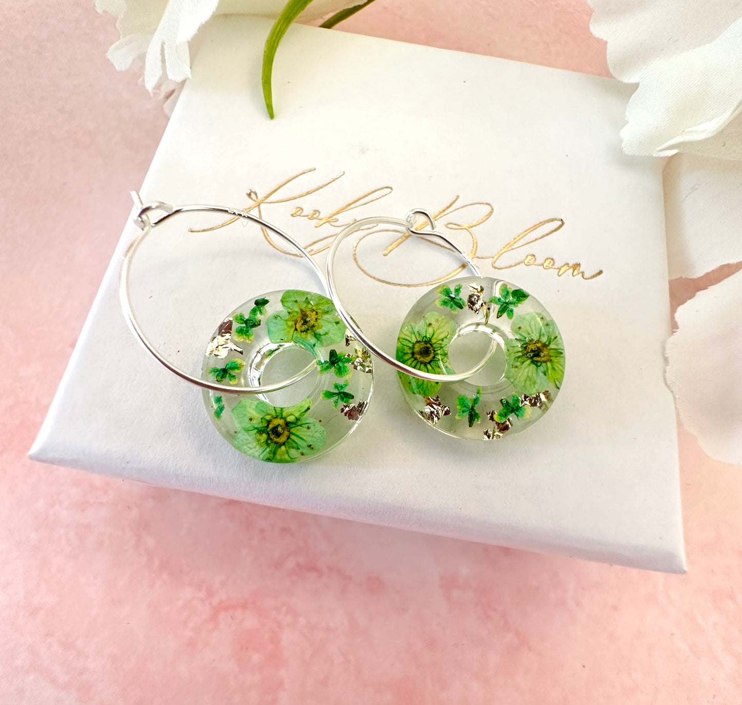 Green blossom bloom flower donut earrings.