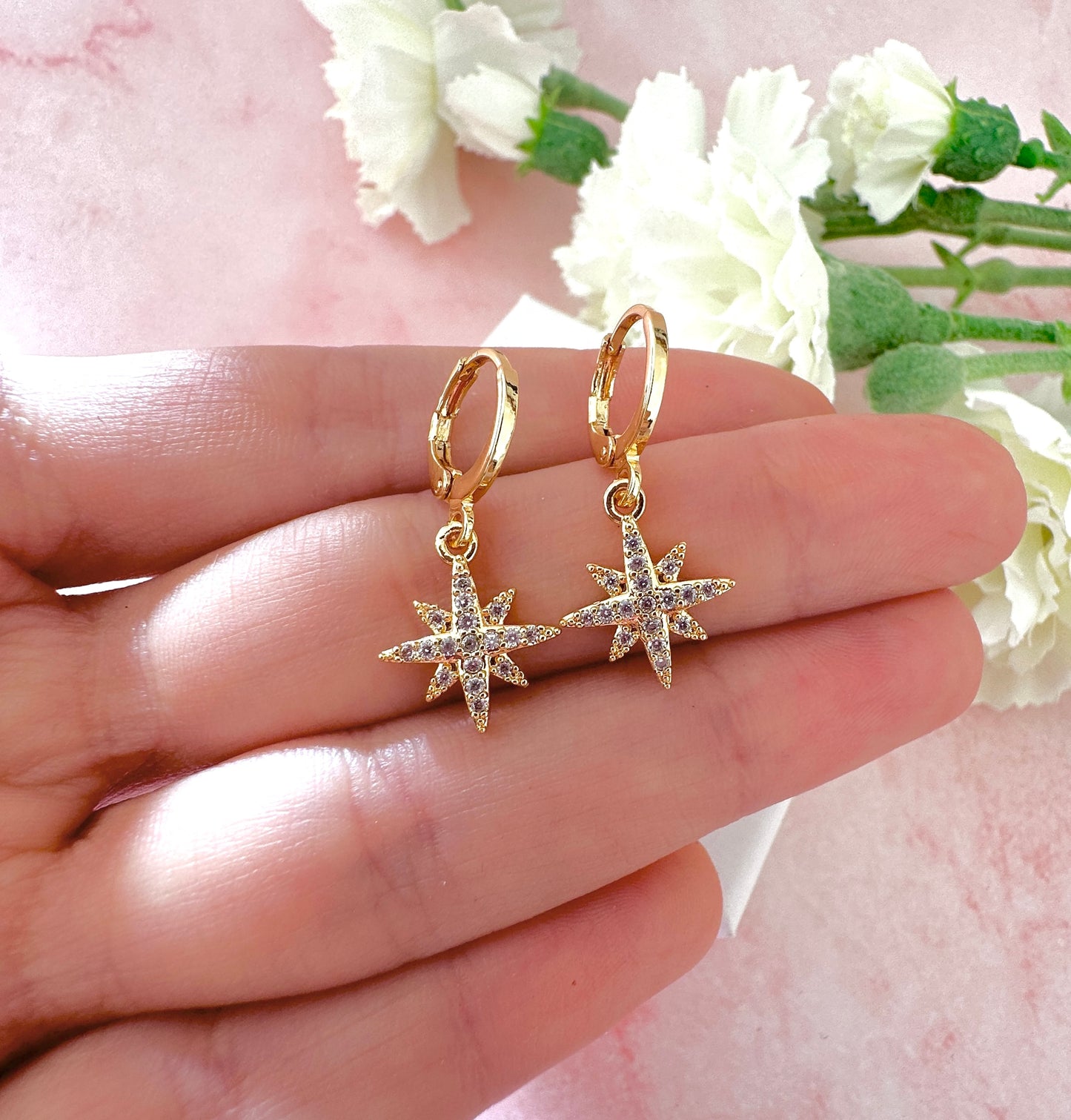 Gold Diamanté Star Huggie  earrings.