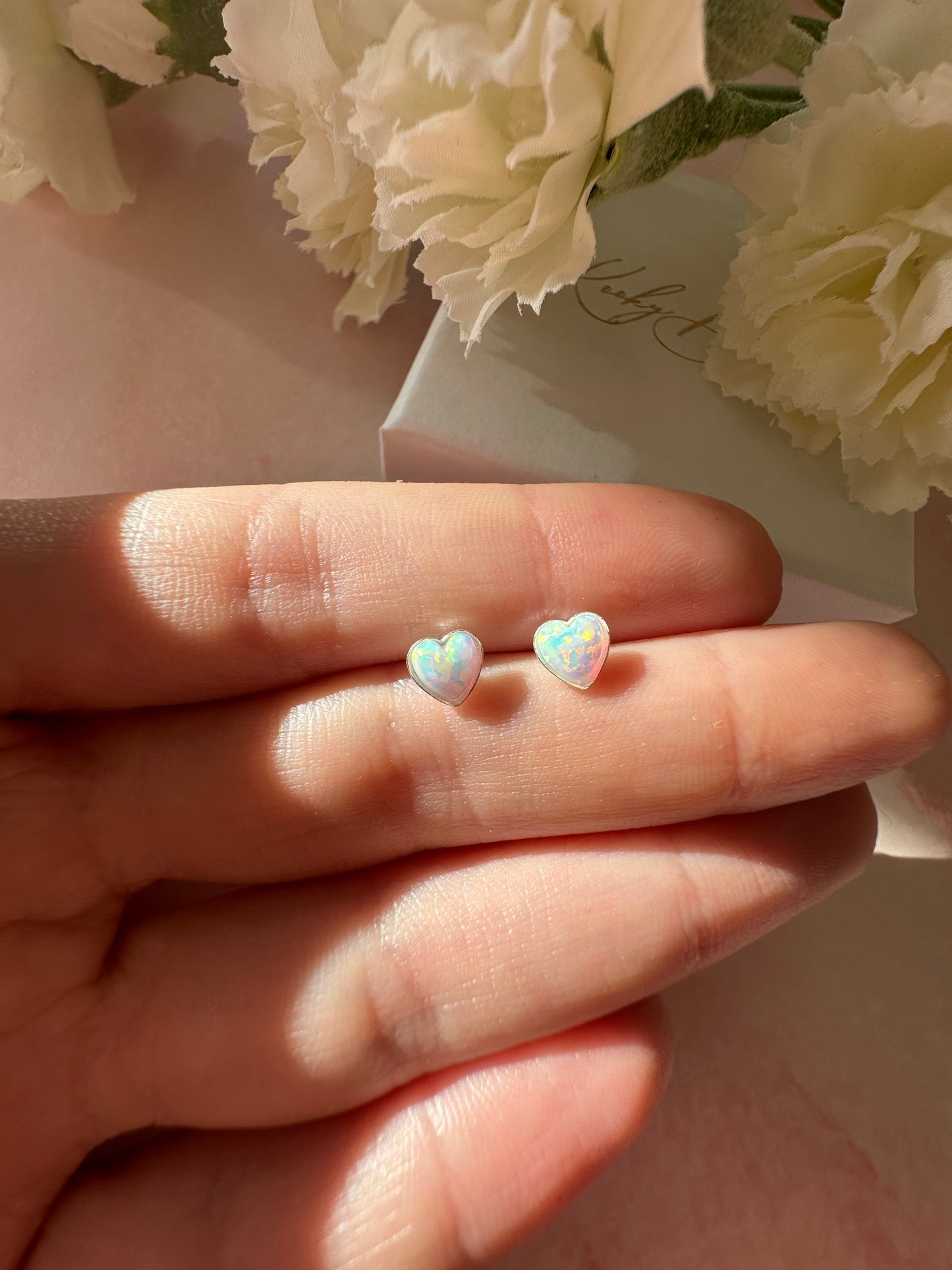 925 Sterling silver White Opal heart stud earrings.