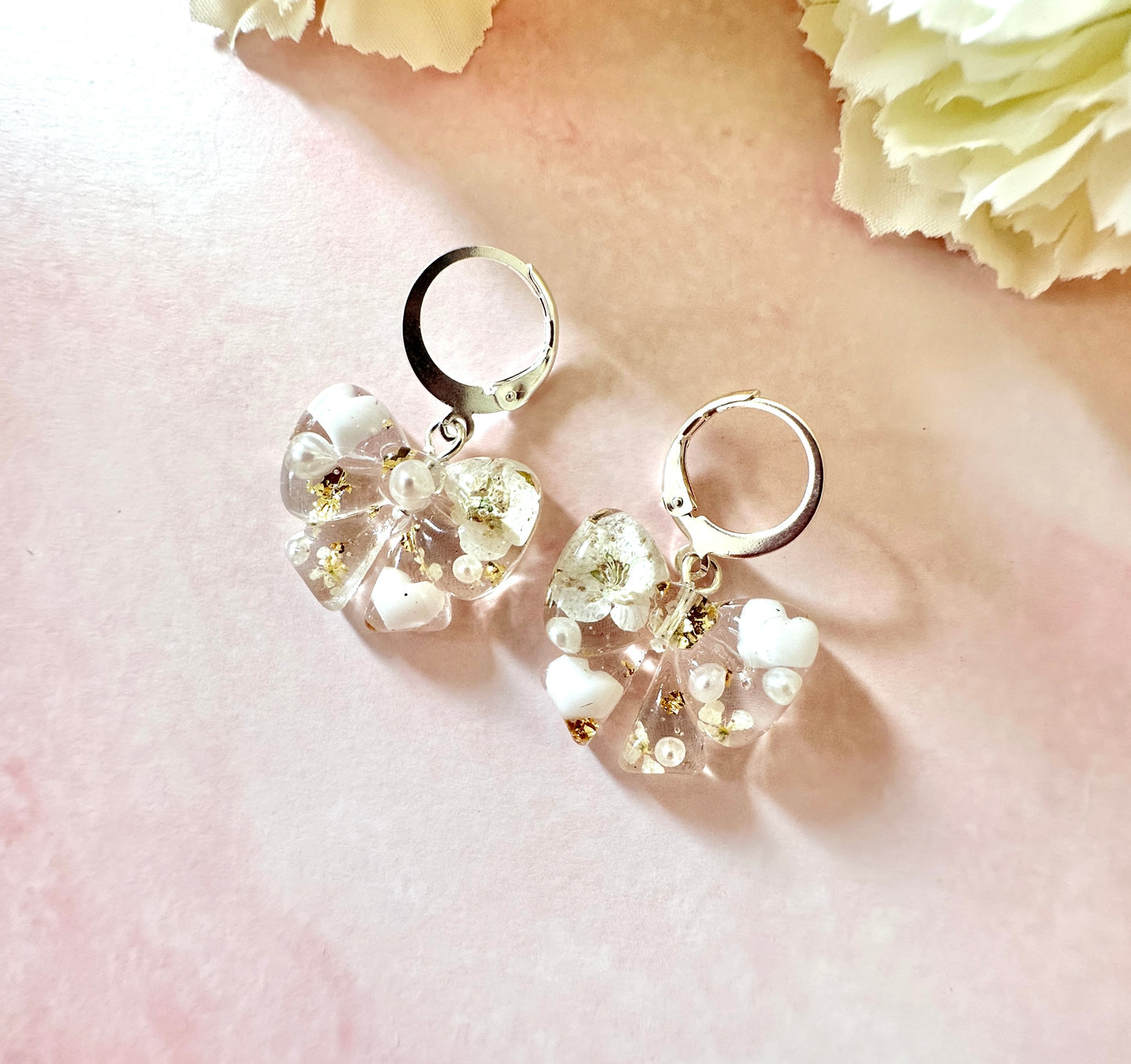 Flower & Pearl Bow bloom Silver Huggie earrings.