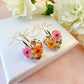 Mini Tangerine pink Flower Heart bloom earrings.