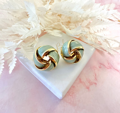 Gold Enamel Knot oversized stud earrings.