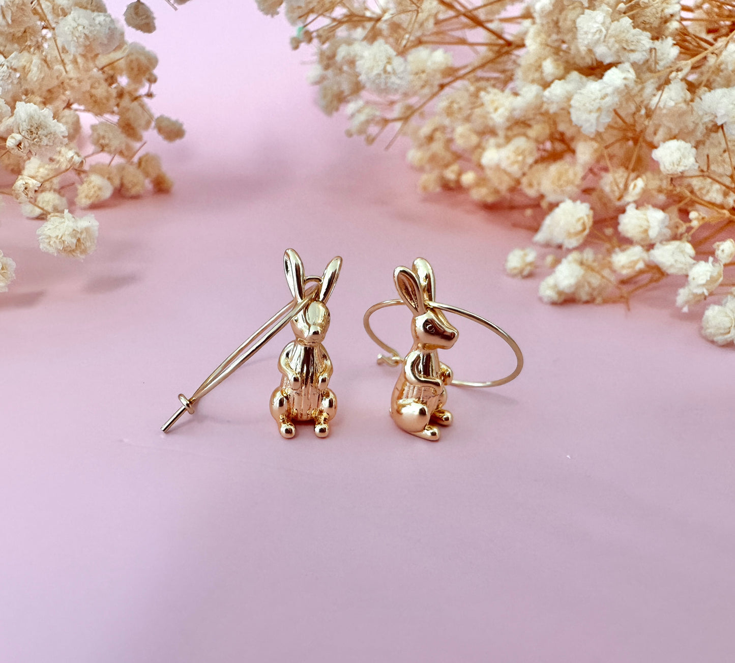 Gold Bunny Hoop earrings.