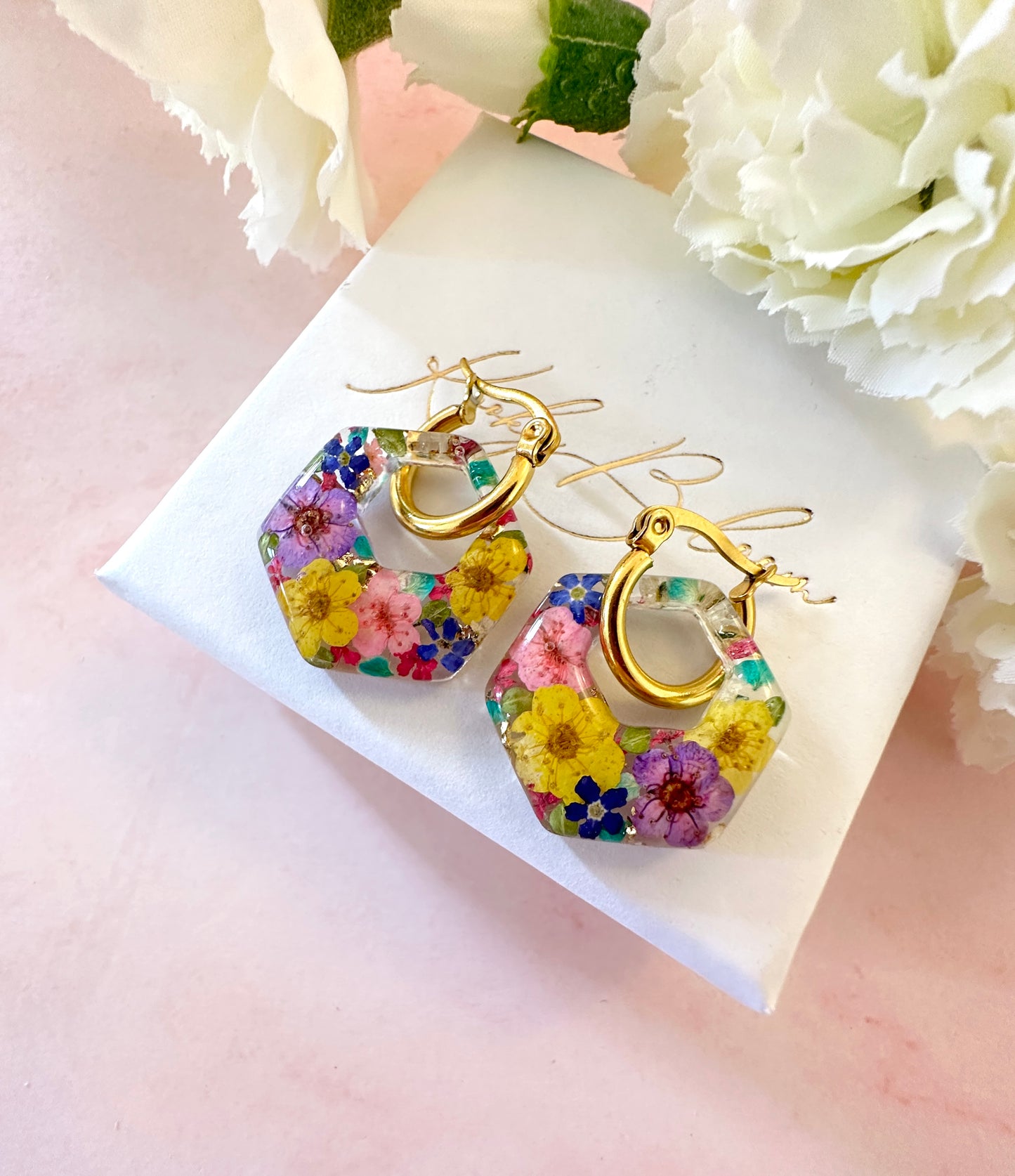 Colourful flower hexagon bloom earrings.