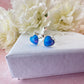 925 Sterling silver Blue Opal heart stud earrings.