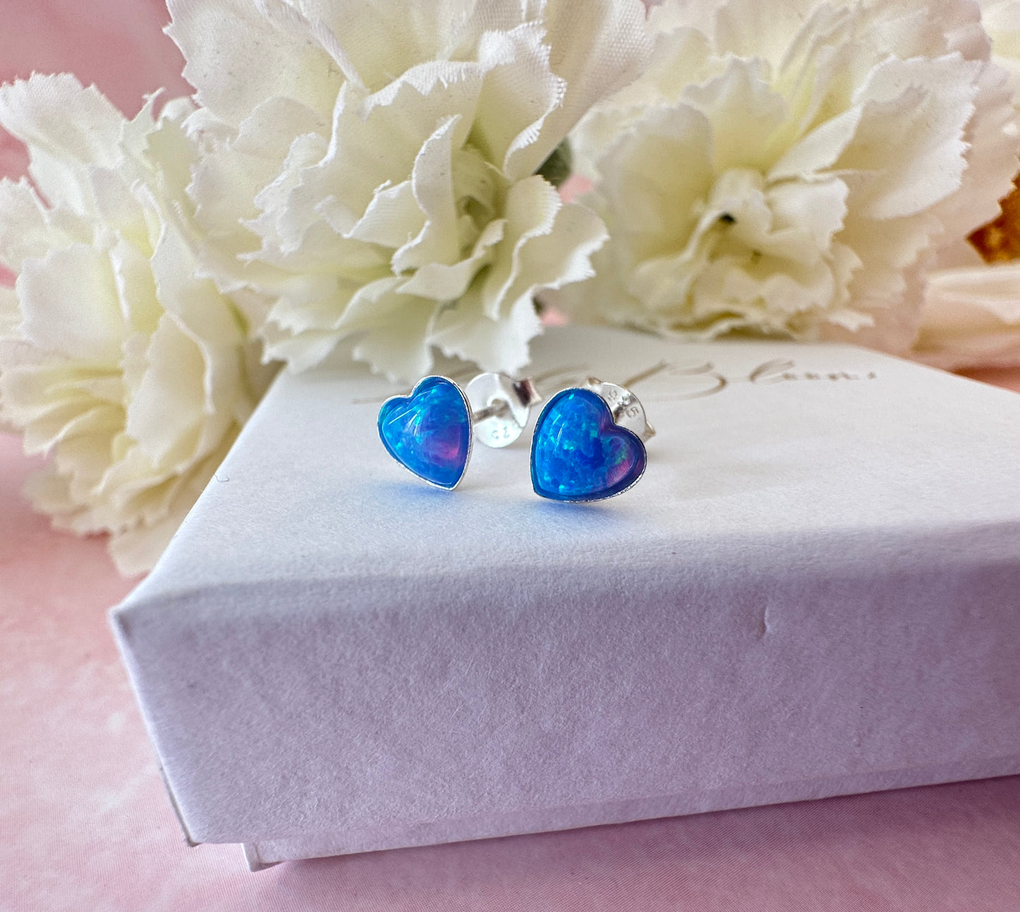 925 Sterling silver Blue Opal heart stud earrings.