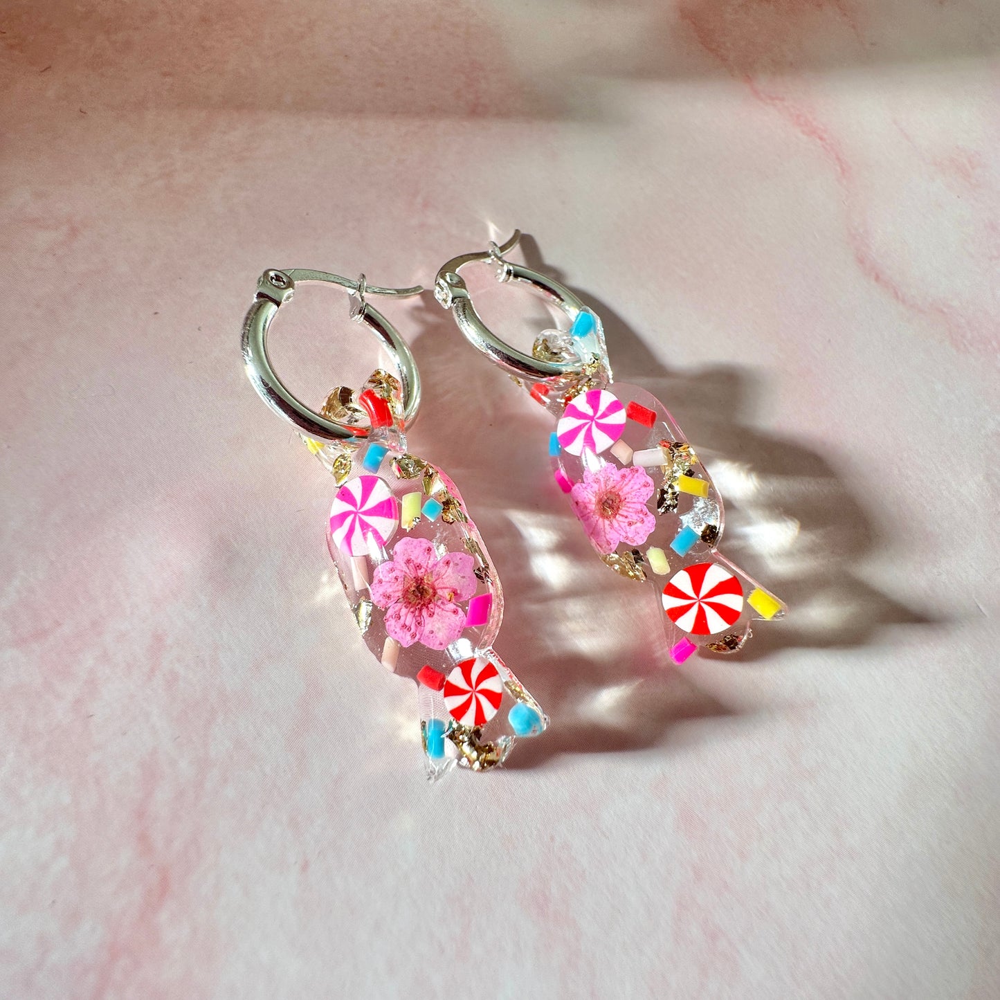 Candy sweet bloom hoop earrings.