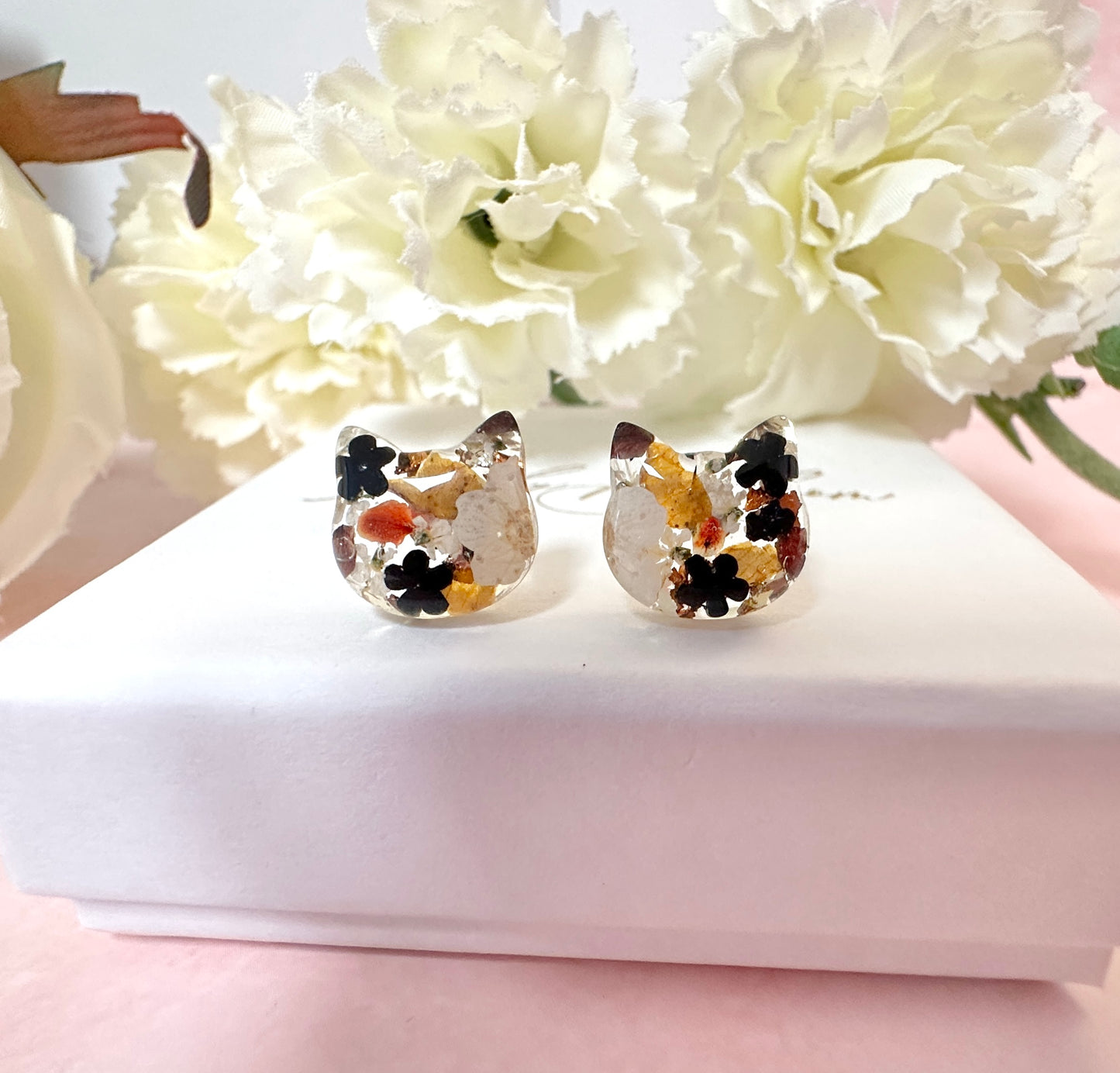 Cat real flower sterling silver stud earrings.