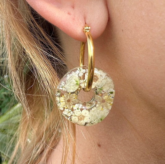 Ivory Flower Donut Hoop earrings.