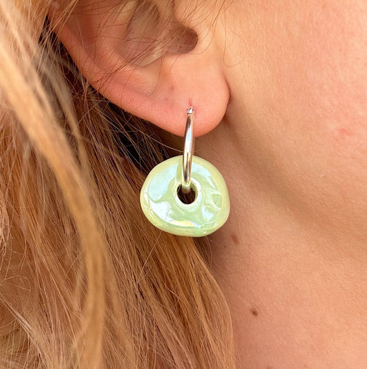 Pale green glazed ceramic Donut huggie Hoop earrings.